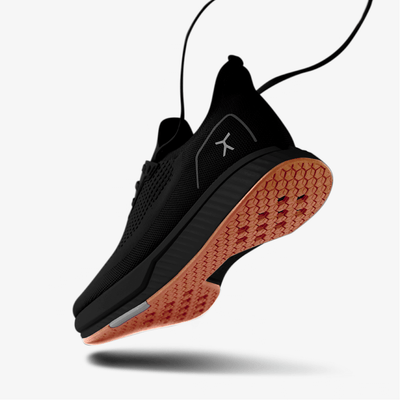 3/4 heel image of Black shoe with Gum Sole Running Shoe #color_black-gum-rn