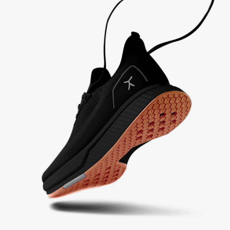 3/4 heel image of Black shoe with Gum Sole Running Shoe 