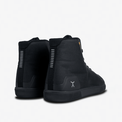 Heel of all black high top workout fitness gym power lifting shoes with flux logo on heel and Graphene-Wear orange logo at collar. #color_graphene-black
