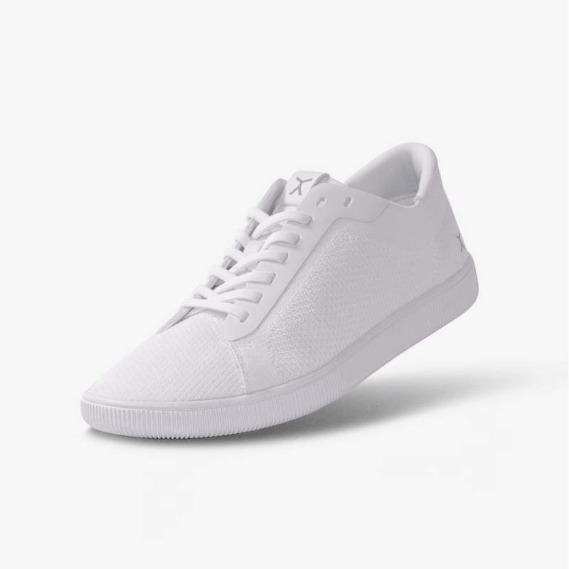 3/4 View: All white athleisure barefoot casual crossfit workout shoes 